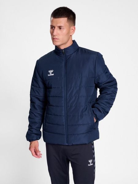 Kurtka puchowa Hummel Essential Szorty Bench. Niebieskie kurtki damskie Hummel, m, bez wzorów, z materiału, bez kaptura. Za 317.60 zł.