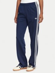 Adidas Spodnie dresowe Firebird Classic KS4795 Granatowy Regular Fit. Niebieskie spodnie dresowe damskie Adidas, s, bez wzorów, z dresówki. Za 299.99 zł.