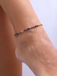 Luja Bijoux Pozłacana bransoletka z kryształami na kostkę rozmiar: onesize. Czarne bransoletki damskie Luja Bijoux, pozłacane. Za 61.31 zł.