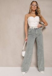 Jasnoniebieskie Jeansy High Waist o Szerokim Kroju z Cyrkoniami i Koralikami Heltewi. Niebieskie jeansy damskie Renee, z aplikacjami, z jeansu. Za 139.99 zł.