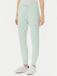 Guess Spodnie dresowe V2YB18 K7UW2 Zielony Regular Fit. Zielone spodnie dresowe damskie Guess, m, z aplikacjami, z dresówki. Za 229.99 zł.