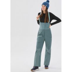 Spodnie narciarskie ogrodniczki damskie Wedze FR900. Niebieskie spodnie sportowe damskie WED'ZE, na zimę, xs, bez wzorów, z materiału, narciarskie. Za 699.99 zł.