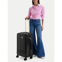 Walizka średnia Nine West. Czarne walizki Nine West, bez wzorów, średnie. Za 359.99 zł.
