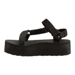 Sandały Teva Model W Flatform Univers Kolor Czarny. Czarne sandały damskie Teva, bez wzorów, z materiału, bez obcasa, bez zapięcia. Za 299.00 zł.