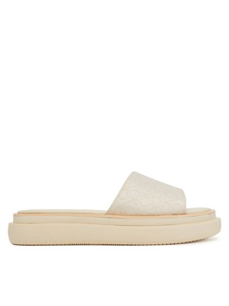 Calvin Klein Klapki Flatform Slide Jacq HW0HW02461 Écru. Klapki damskie Calvin Klein, bez wzorów, z materiału, bez obcasa, bez zapięcia. Za 259.99 zł.
