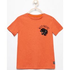 T-shirt z nadrukiem na plecach - Pomarańczo. Koszulki i t-shirty dziewczęce marki FOUGANZA. W wyprzedaży za 19.99 zł.
