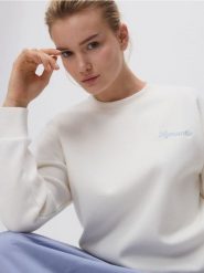 Bluza z haftem - złamana biel. Bluzy damskie Reserved, l, bez wzorów, z bawełny, bez kaptura. W wyprzedaży za 39.99 zł.