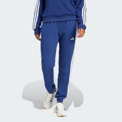Spodnie Essentials 3-Stripes French Terry Cuffed. Czarne obuwie sportowe damskie Adidas, z materiału, na fitness i siłownię. Za 219.00 zł.