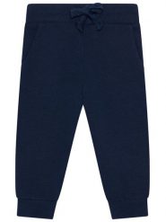 Guess Spodnie dresowe L93Q24 KAUG0 Granatowy Regular Fit. Niebieskie spodnie dresowe chłopięce Guess, z bawełny. Za 109.99 zł.