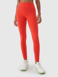 4F Legginsy funkcyjne w kolorze pomarańczowym rozmiar: XS/S. Pomarańczowe legginsy damskie 4F, s, bez wzorów, z materiału, na fitness i siłownię. Za 74.46 zł.