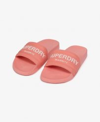 Superdry klapki Destination Pool z wyściełanym paskiem – Peach Amber Pink. Czerwone klapki damskie Superdry, bez wzorów, z poliesteru, bez obcasa, bez zapięcia. Za 152.50 zł.