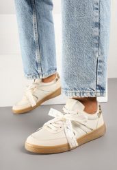 Beżowe Sneakersy Typu Kultowe Tenisówki z Ozdobną Odpinaną Kokardą Korilinda. Brązowe obuwie sportowe damskie Renee, bez wzorów, z jeansu, bez zapięcia. Za 89.99 zł.