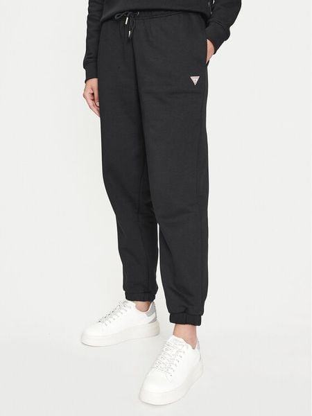 Guess Jeans Spodnie dresowe W4YB33 KC811 Czarny Regular Fit. Czarne spodnie dresowe damskie Guess Jeans, xxl, z aplikacjami, z bawełny. Za 209.99 zł.
