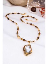 Pierres delicates Naszyjnik w kolorze białym z perłami i kamieniami szlachetnymi - dł. 50 cm rozmiar: onesize. Brązowe naszyjniki damskie Pierres delicates, z cyrkonią, z mosiądzu. Za 161.34 zł.