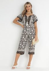 Czarny Kombinezon Hesonia. Czarne sukienki damskie Born2be, z aplikacjami, boho, bez ramiączek. Za 129.99 zł.