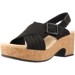 Sandały CLARKS NERISA WEST Czarny. Czarne sandały damskie Clarks, bez wzorów, ze skóry, bez obcasa, bez zapięcia. Za 194.99 zł.