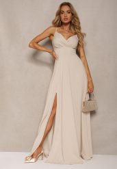 Beżowa Elegancka Sukienka o Rozkloszowanym Kroju z Rozcięciem na Ramiączkach z Kopertowym Dekoltem Winelia. Brązowe sukienki damskie Renee, bez wzorów, eleganckie, bez ramiączek. W wyprzedaży za 135.99 zł.