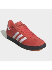 Adidas Skórzane sneakersy "Gazelle" w kolorze pomarańczowym rozmiar: 38. Pomarańczowe obuwie sportowe damskie Adidas, bez zapięcia. Za 271.03 zł.