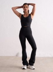 Damskie legginsy rozszerzane nogawki, wysoki stan, squat proof Sense czarny. Czarne legginsy damskie Aim'n, s, bez wzorów, z elastanu. Za 339.00 zł.