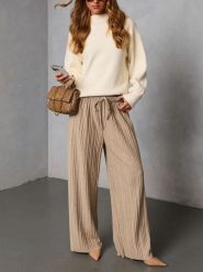 LA Angels Spodnie w kolorze beżowym rozmiar: S. Brązowe spodnie materiałowe damskie LA Angels, bez wzorów, z materiału. Za 195.99 zł.