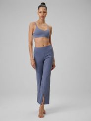 4F Spodnie do jogi z rozszerzanymi nogawkami damskie - niebieskie L. Niebieskie spodnie dresowe damskie 4F, l, bez wzorów, ze skóry, z podwyższonym stanem, na jogę i pilates. Za 169.99 zł.