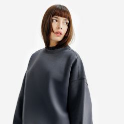 Bluza okrągły dekolt damska Elementals. Niebieskie bluzy damskie Decathlon, m, bez wzorów, z bawełny, bez kaptura. Za 149.99 zł.