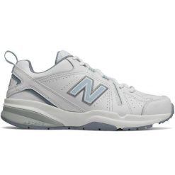 Skórzane Buty Sportowe Dla Kobiet. Białe obuwie sportowe casual damskie New Balance, bez zapięcia. Za 655.99 zł.