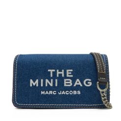 Torebka Marc Jacobs. Niebieskie torebki wieczorowe damskie Marc Jacobs, bez wzorów, z denimu, bez dodatków. Za 769.99 zł.