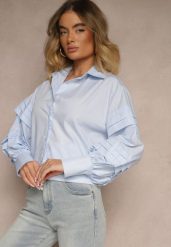 Jasnoniebieska Koszula z Bawełną i Szerokimi Rękawami Edioniela. Niebieskie koszule damskie Renee, na wiosnę, m, bez wzorów, z bawełny, eleganckie, bez kołnierzyka, bez ramiączek. Za 79.99 zł.