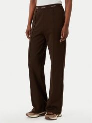 Calvin Klein Jeans Spodnie dresowe LV047G253G Brązowy ciemny Relaxed Fit. Brązowe spodnie dresowe damskie Calvin Klein Jeans, xxl, bez wzorów, z bawełny. Za 409.99 zł.