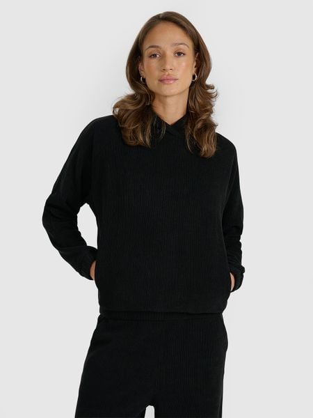 4F Bluza dresowa nierozpinana z kapturem damska - czarna L. Czarne bluzy damskie 4F, l, bez wzorów, z dresówki, z kapturem. Za 159.99 zł.