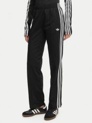 Adidas Spodnie dresowe Firebird Classic KD5575 Czarny Regular Fit. Czarne spodnie dresowe damskie Adidas, xl, bez wzorów, z dresówki. Za 299.99 zł.