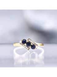 CARATELLI Złoty pierścionek "Melbourne" z diamentami i szafirami rozmiar: 50. Niebieskie pierścionki damskie CARATELLI, z diamentem, złote. Za 1,148.95 zł.