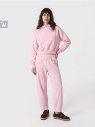 Spodnie dresowe z bawełną - różowy. Czerwone spodnie sportowe damskie Sinsay, l, bez wzorów, z bawełny, na fitness i siłownię. Za 39.99 zł.