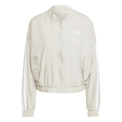 Kurtka damska adidas Essentials 3-stripes. Białe kurtki sportowe damskie Adidas, xl, bez wzorów, z materiału, bez kaptura. Za 292.00 zł.