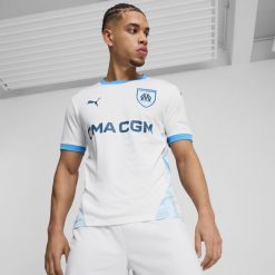Koszulka piłkarska Puma Olympique de Marseille domowa 24/25. Bluzki damskie Puma, m, bez wzorów, z materiału, bez kołnierzyka, bez ramiączek. W wyprzedaży za 339.99 zł.