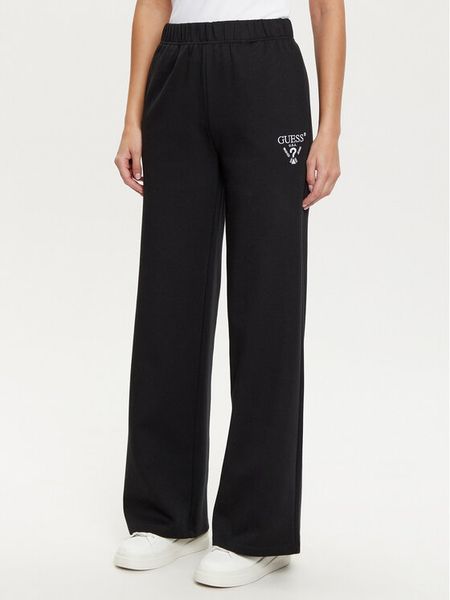 Guess Spodnie dresowe V5RB12 KC3D2 Czarny Regular Fit. Czarne spodnie dresowe damskie Guess, xl, z aplikacjami, z dresówki. Za 229.99 zł.