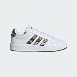 Adidas Junior KI5695 Biały - Tenisówki lifestyle. Białe trampki damskie Adidas, bez wzorów, z materiału, bez zapięcia. Za 160.99 zł.