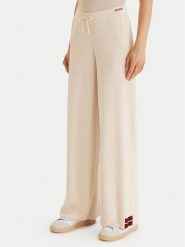Guess Spodnie dresowe V6GB06 Z0651 Beżowy Wide Leg. Brązowe spodnie dresowe damskie Guess, xs, z aplikacjami, z dresówki. Za 569.99 zł.