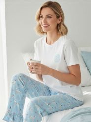 Piżama dwuczęściowa z motywem dalmatyńczyków - niebieski. Niebieskie piżamy damskie Sinsay, bez wzorów, bez ramiączek. Za 49.99 zł.