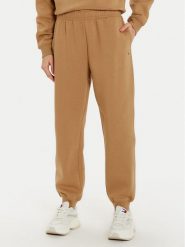 Tommy Hilfiger Spodnie dresowe Essential WW0WW45966 Beżowy Regular Fit. Brązowe spodnie dresowe damskie Tommy Hilfiger, xxl, bez wzorów, z bawełny. Za 299.99 zł.