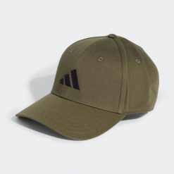 Czapka z daszkiem ADIDAS. Czapki z daszkiem damskie Adidas, bez wzorów, z bawełny. Za 89.99 zł.