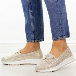 Złote ażurowe skórzane półbuty damskie Filippo Dp7651/26. Żółte półbuty damskie Filippo, na jesień, w ażurowe wzory, z jeansu, z okrągłym noskiem, bez obcasa, na płaskiej podeszwie, bez zapięcia. Za 219.00 zł.