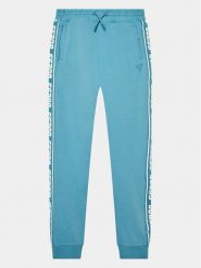 Guess Spodnie dresowe L2YQ48 K6ZS1 Niebieski Regular Fit. Niebieskie spodnie dresowe chłopięce Guess, z bawełny. Za 469.99 zł.