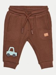 Coccodrillo Spodnie dresowe ZC4120103MBN Brązowy Regular Fit. Brązowe spodnie dresowe chłopięce COCCODRILLO, z bawełny. Za 39.99 zł.