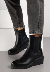 Czarne Botki Sztyblety na Koturnie Fesirea. Czarne botki damskie Born2be, z jeansu, eleganckie, bez obcasa, na koturnie, bez zapięcia. Za 129.99 zł.