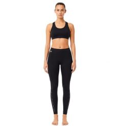 Spodnie sportowe damskie Lacoste. Czarne spodnie sportowe damskie Lacoste, na lato, uniwersalny, bez wzorów, z elastanu, na fitness i siłownię. Za 357.00 zł.