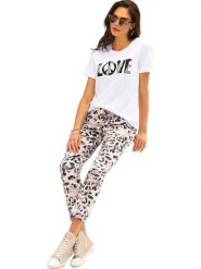 Heine Koszulka w kolorze białym rozmiar: 48. Białe bluzki damskie Heine, bez wzorów, z bawełny, bez kołnierzyka, bez ramiączek. Za 43.99 zł.