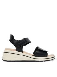 Caprice Sandały 9-28305-46 Czarny. Czarne sandały damskie Caprice, bez wzorów, ze skóry, bez obcasa, na koturnie, bez zapięcia. Za 228.99 zł.