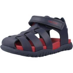 Sandały Geox Model B Sandal Fusbetto Bo Kolor Niebieski. Niebieskie sandały damskie Geox, bez wzorów, z tkaniny, bez obcasa, bez zapięcia. Za 189.99 zł.